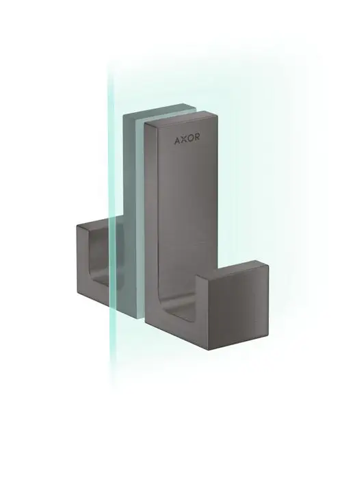 Duschtürgriff aus gebürstetem Schwarzchrom von AXOR, rechteckige Form, montiert an einer Glasscheibe, zeigt eine klare Verbindung zwischen Griff und Oberfläche.